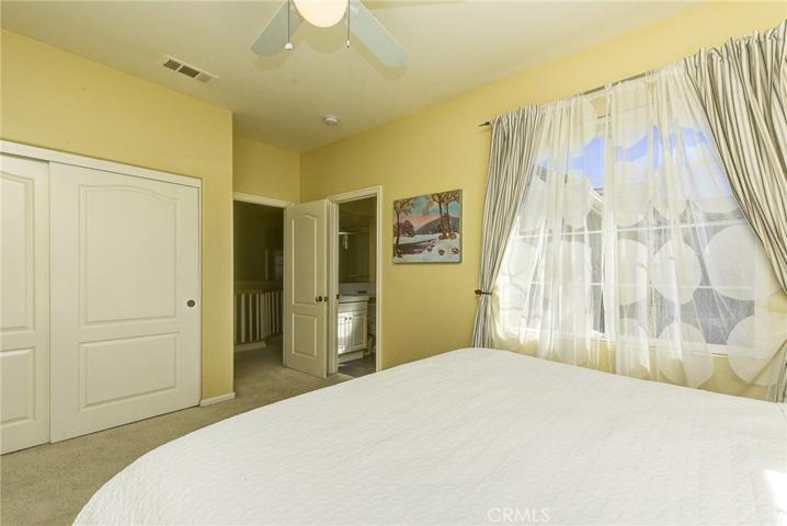 Secondary bedroom suite has large wardrobe closet, ensuite bath and plenty of room for king size bed.