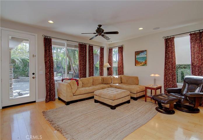 Great room has plenty of room for many furniture options...plus huge windows and French door for easy access to rear yard.