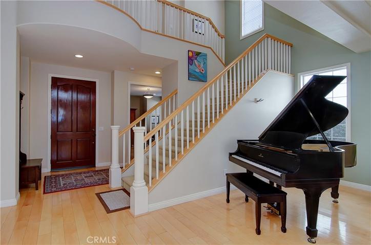 Separate entry foyer is the perfect place to greet family or guests, and provides a nice transition between spaces.