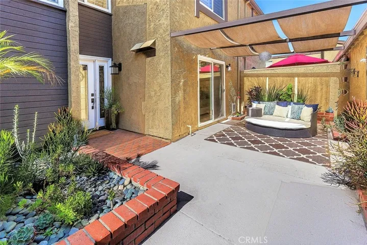 Front of home features drought resistant landscaping, quikrete concrete resurfacing, and new exterior light fixtures.  Detached garage features brand new exterior doors, epoxy floors, and built in attic space for storage.