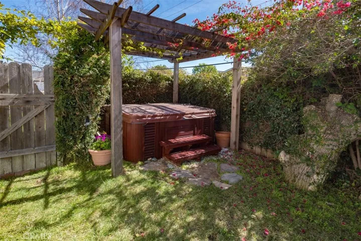Custom built Pergola surrounding Catalina Jacuzzi. Morning Glories and Passion Fruit galore.