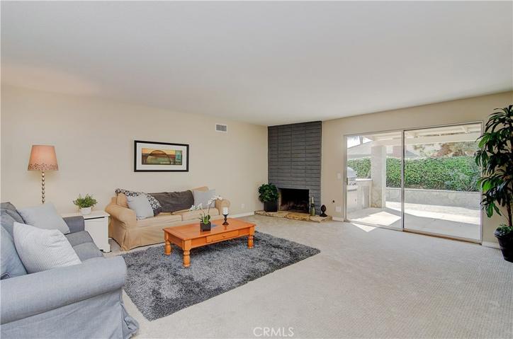 Spacious living with new plush carpeting and great natural light flowing throughout.