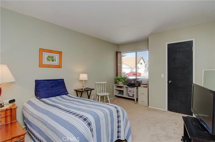 Secondary bedrooms are large...this one has nice window niche...perfect for a desk...walk-in closet too.
