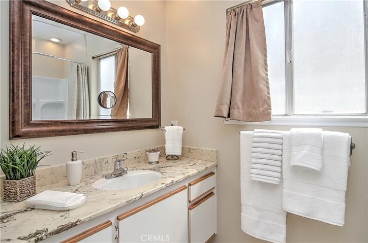 One of the THREE bathrooms in this house with a shower. Yes, 3!