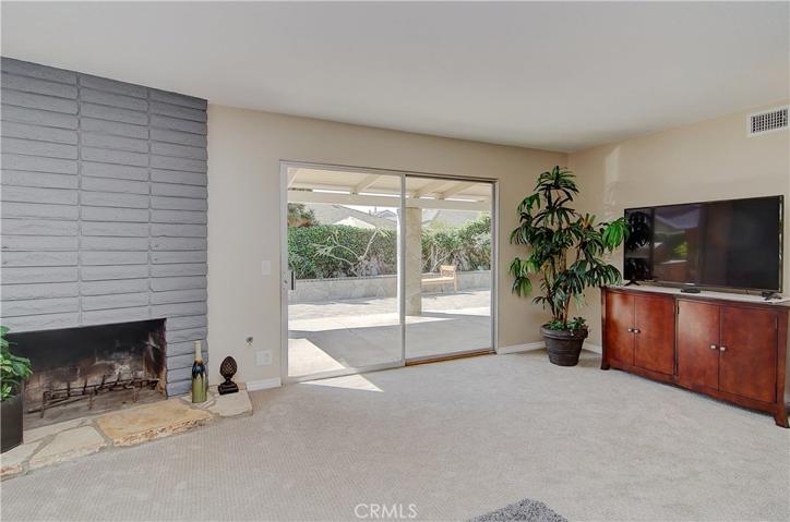 Floor to ceiling brick fireplace is truly the focal point of the room.