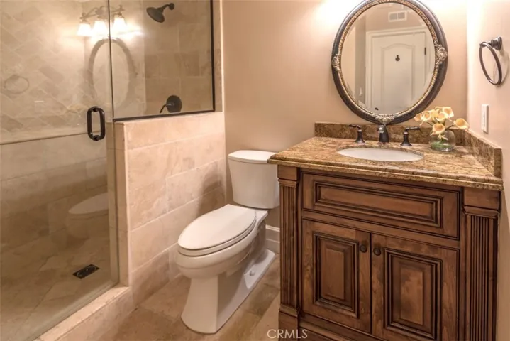 Full bath on 1st floor adjacent to bonus office space and laundry.