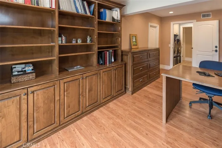 Bonus room/office approx 264 sf - once was 3rd parking stall. AC/Heat, full bathroom and laundry adjacent. French doors leading outside.