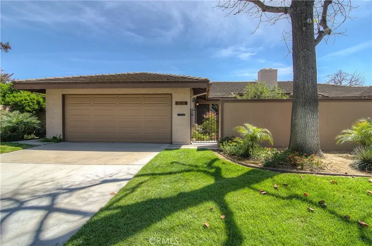 Nice street appeal with lush lawn and mature shade tree...extra long driveway provides plenty of off street parking.
