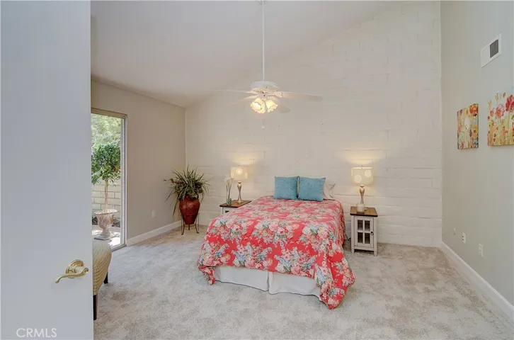 Nice vaulted ceiling in master...and many ceiling fans throughout the home.