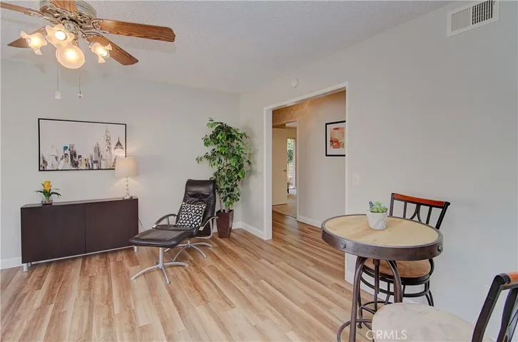 Additional room by the kitchen could be dining room, home office or cozy TV/gaming area...another slider to side yard too.