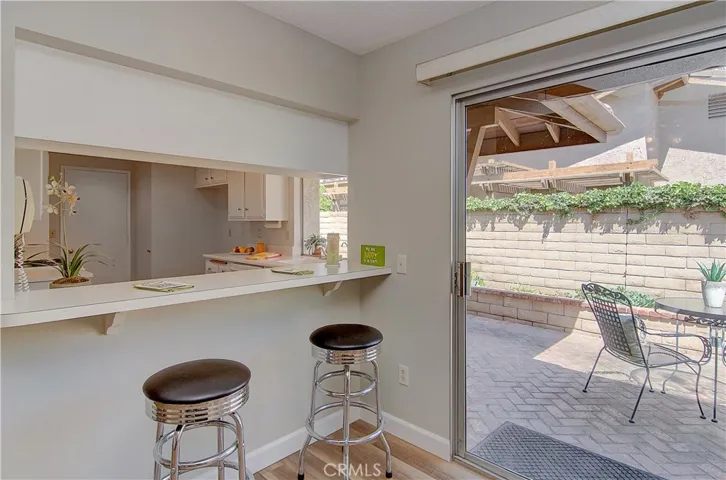 Bar area is great for extra counter space, kids homework or supervising meal prep.