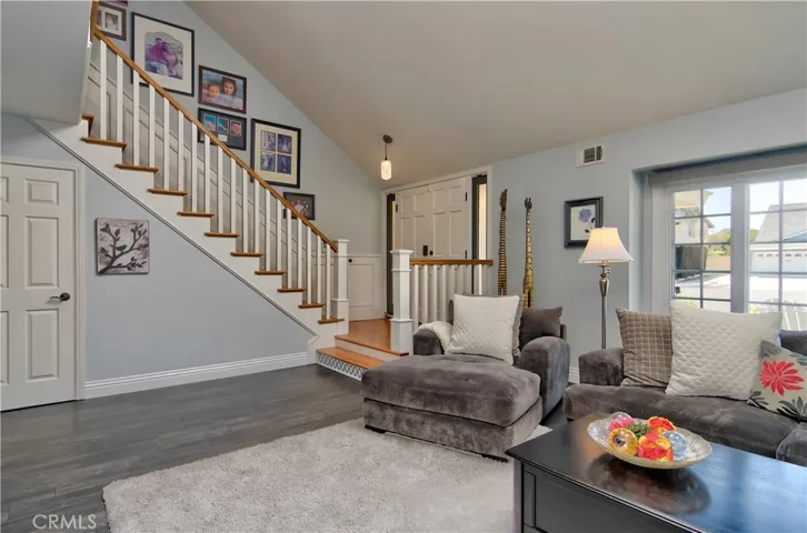 Huge Closet Under the Stairs, Plus Exquisite Railing & Hardwood Treads Enhance The Quality Feel.