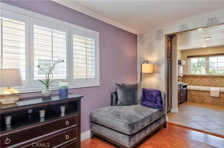 Lovely moldings and shutters, plus hardwood flooring really create a custom feel...