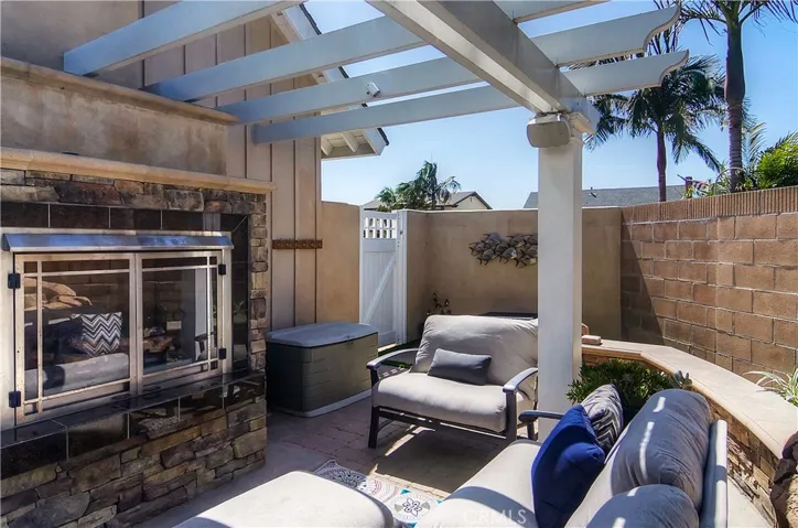 Outdoor fireplace is the perfect place to cozy up to...what a great conversion place...