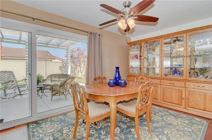 Dining area is perfect for casual family meals...or entertaining friends...huge slider offers lovely views of rear yard and makes for easy flow to the outside...we all love our Southern California lifestyle!