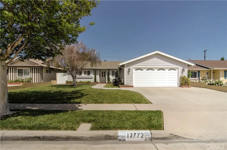 Fantastic curb appeal with fresh, contemporary paint and sweeping front lawn.