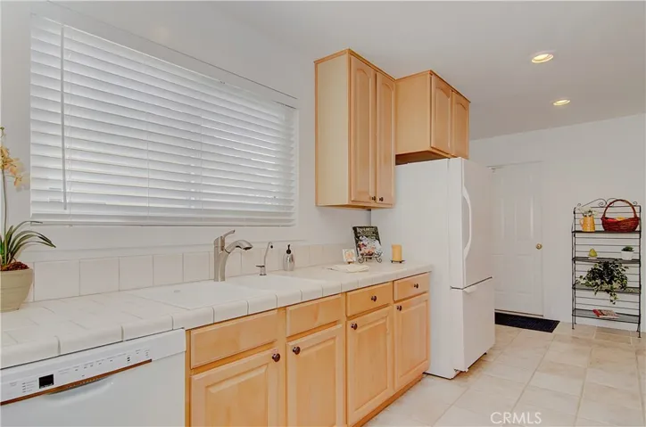 Even more utility space and easy access to attached garage and side yard.