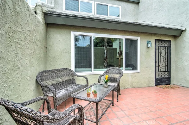Front entry patio is a nice, private place to soak in the sun and feel the ever present ocean breezes.