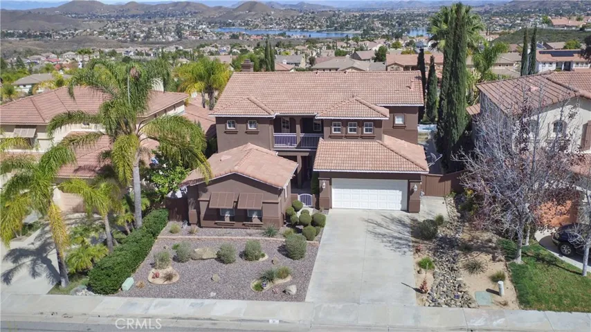 EXECUTIVE STYLE SALT WATER POOL & LAKE VIEW HOME! Professional drought tolerant landscaping!