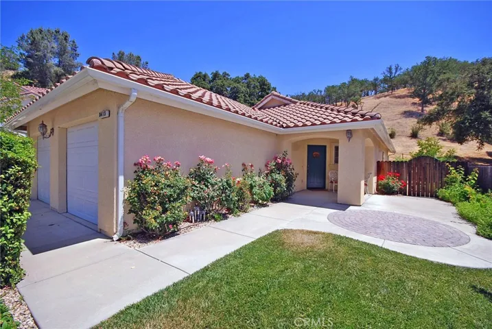 Rare, single level home ideally located in the gated community of Chalk Mountain Village!