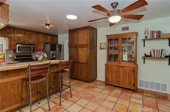 Plenty of cabinets, plus room to expand with even more...this space would be awesome with a huge island.