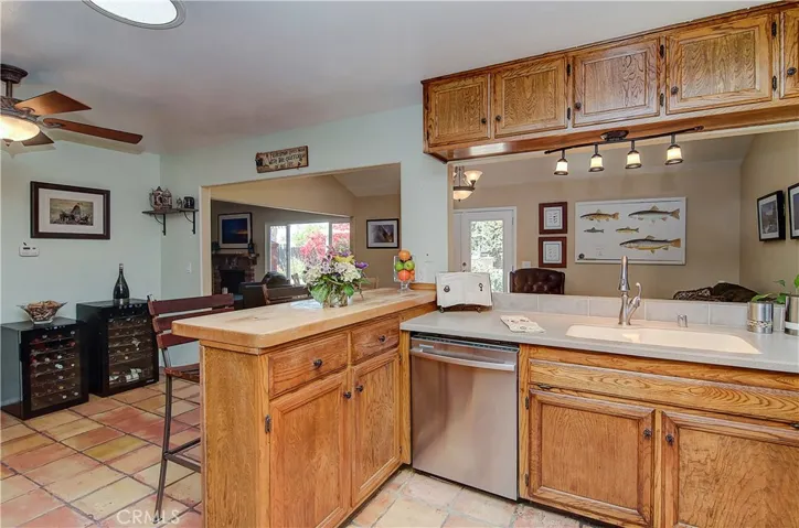 Butcher block island makes a nice extra prep area for chef's helpers...or a place enjoy a nice glass of wine and watch the magic!