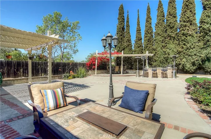 WOW is right! Near 8,000 Sq Ft lot offers endless entertaining possibilities...including room for a pool too!