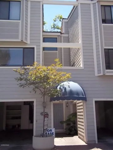 Courtyard entry, garage & carport