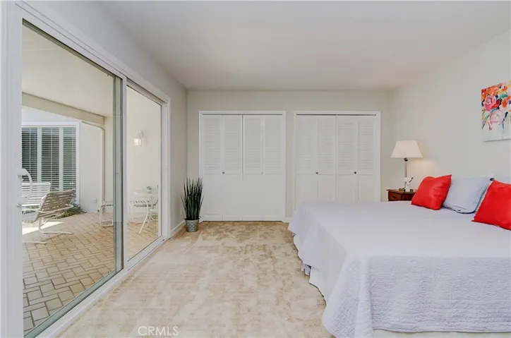 Master opens to atrium...large double wardrobe closet has loads of space.