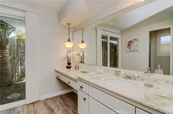 Master bath still has mint condition mid-century details...plenty of counter and dressing space too.