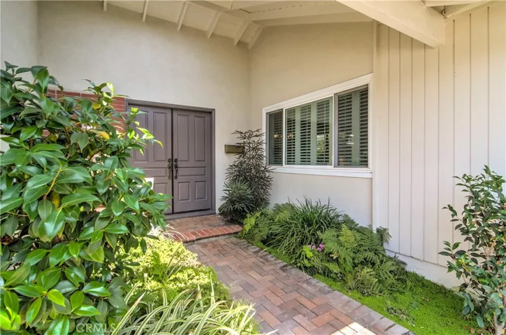 This atrium is a great place to greet family and guests...and enhanced by double entry doors.