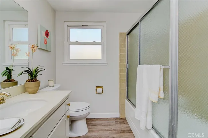 Sparkling hall bath is convenient to guest rooms and outdoors...more immaculate, period details.