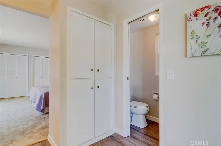 Large linen storage and separate shower and toliet area...new plank flooring too.
