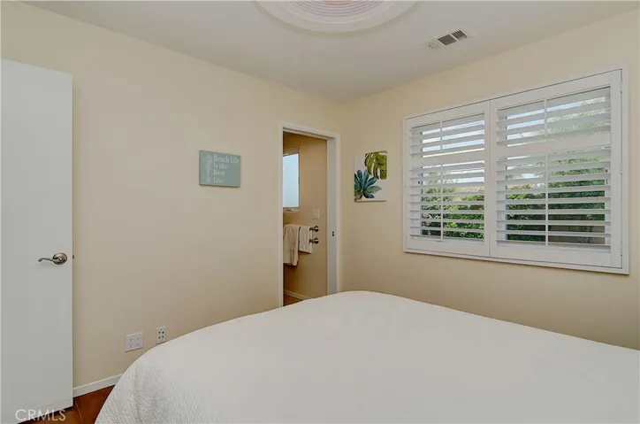 All bedrooms have beautiful plantation shutters with custom privacy detail.