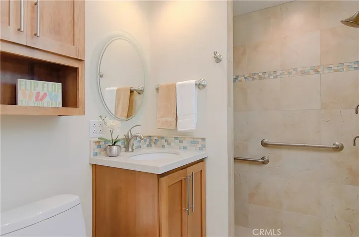 Ensuite bath has large, custom shower and designer details.