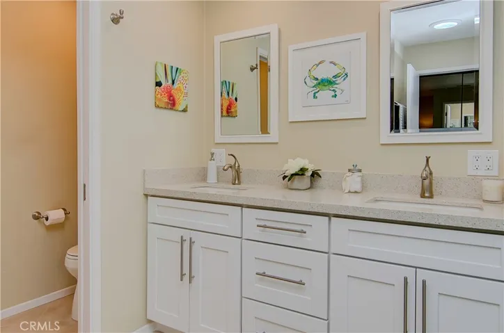 Master bath has all the features you could ask for...custom cabinetry, quartz counters, and separate commode area with linen closet.
