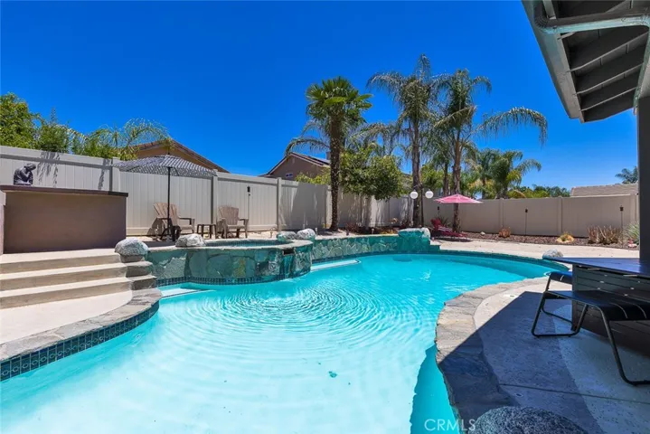 Picture yourself swimming in the pool while the waterfall trickles in the background.....