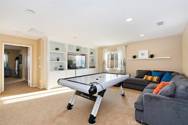 Loft with built in entertainment/storage unit