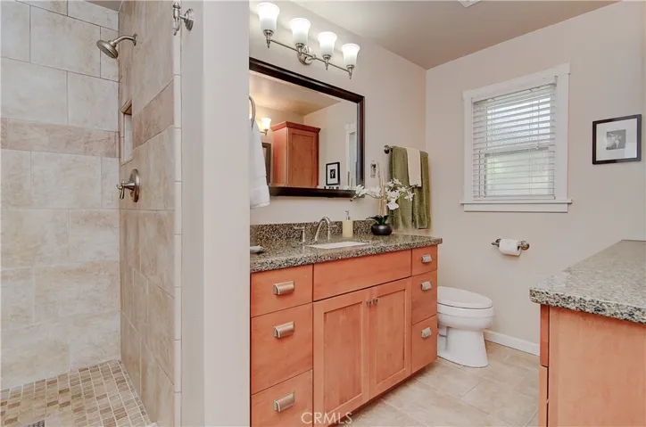 Remodeled hall bath: The floor tile will keep your feet warm whenever it starts to cool down!