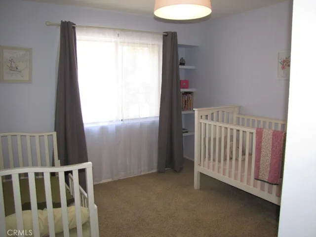 SECONDARY BEDROOM IS PLENTY SPACIOUS FOR TWO LITTLE ONES!