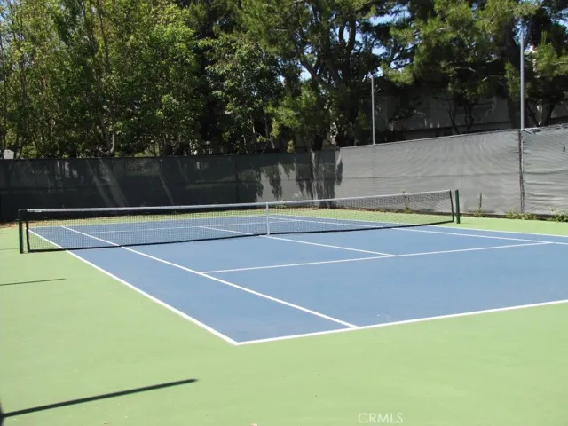 TENNIS ANYONE?  LOCATED NEAR EACH OF THE POOLS SO YOU CAN COOL OFF QUICK AFTER A MATCH!