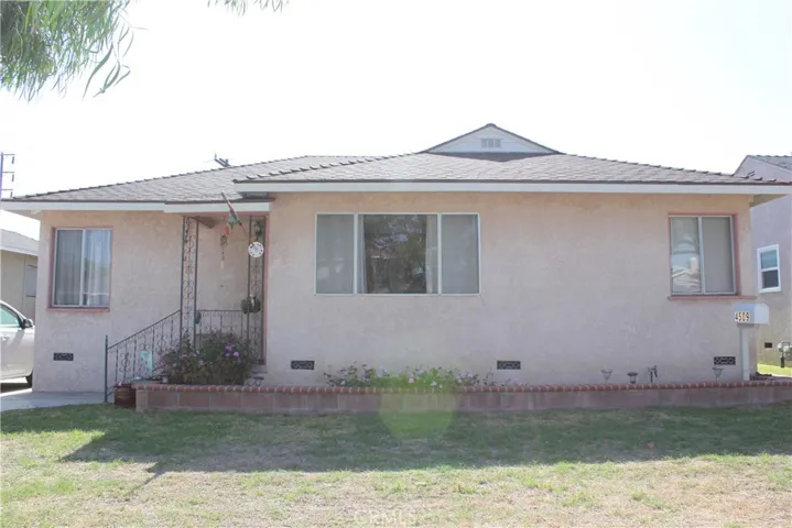 Large 4 bedroom home. New roof, porch, brick planter. Great neighborhood!