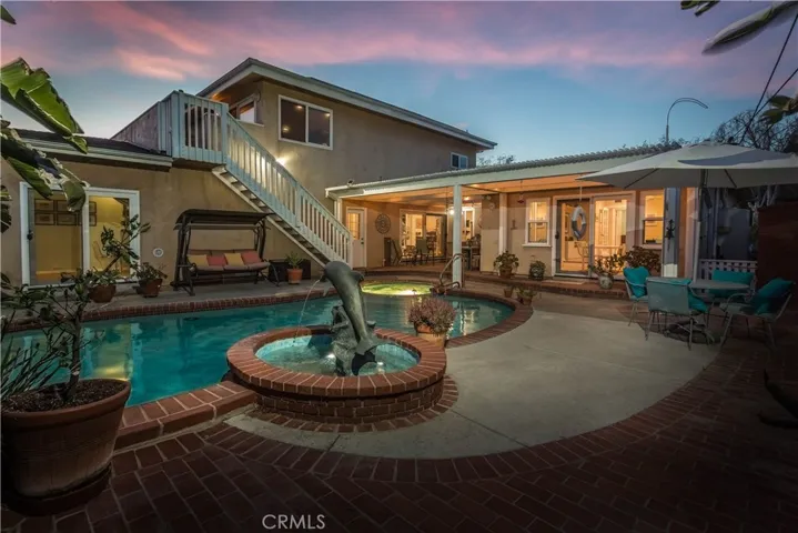 Is this your home or a resort? Back yard is made for entertaining