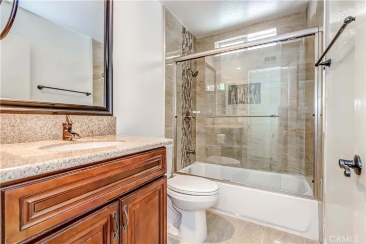 Up stairs, hallway bathroom. newly installed tub and tiles.