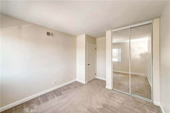 Up stairs, 3rd bedroom with mirrored closet