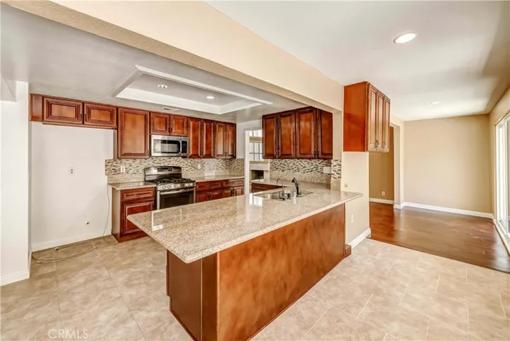 Lots of spaces off the kitchen. Create your own dining area for your family