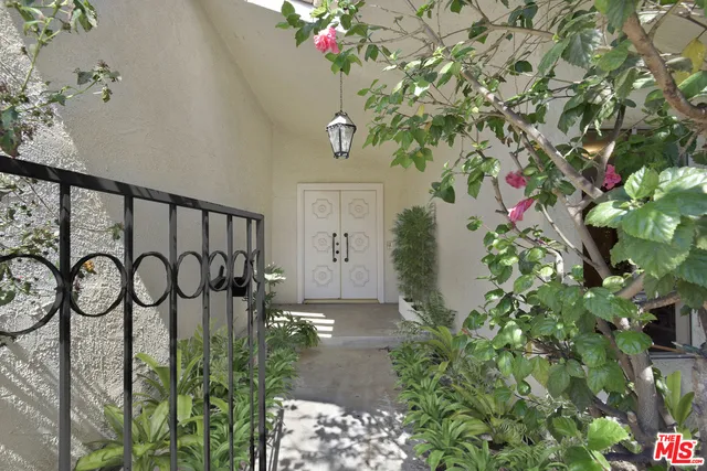 Virtually painted gate & entry garden.