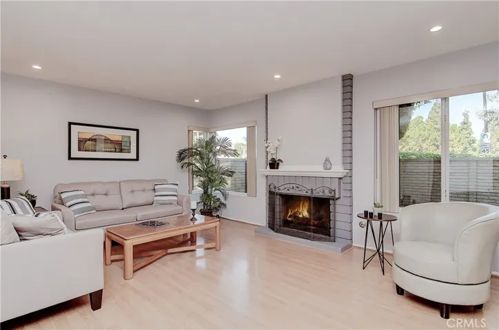 Great room concept in this open, contemporary floor plan let's your enjoy the fireplace and patio views from every angle.