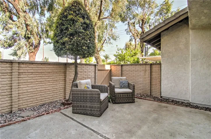 Plenty of space for alfresco dining, relaxing, or sunning...planter areas offer many options for the gardner in you!