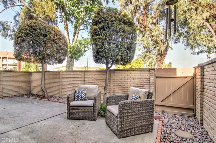 Large, private patio has plenty of space for outdoor gatherings...gate allows easy access to private greenbelt...it's like having a large grassy back yard that somone else maintains! The best of both!